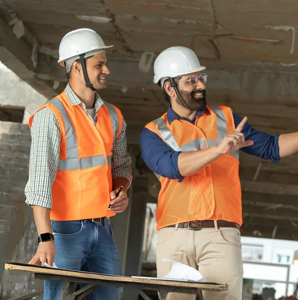 Roofing contractors in Vancouver BC wearing safety gear on commercial roof